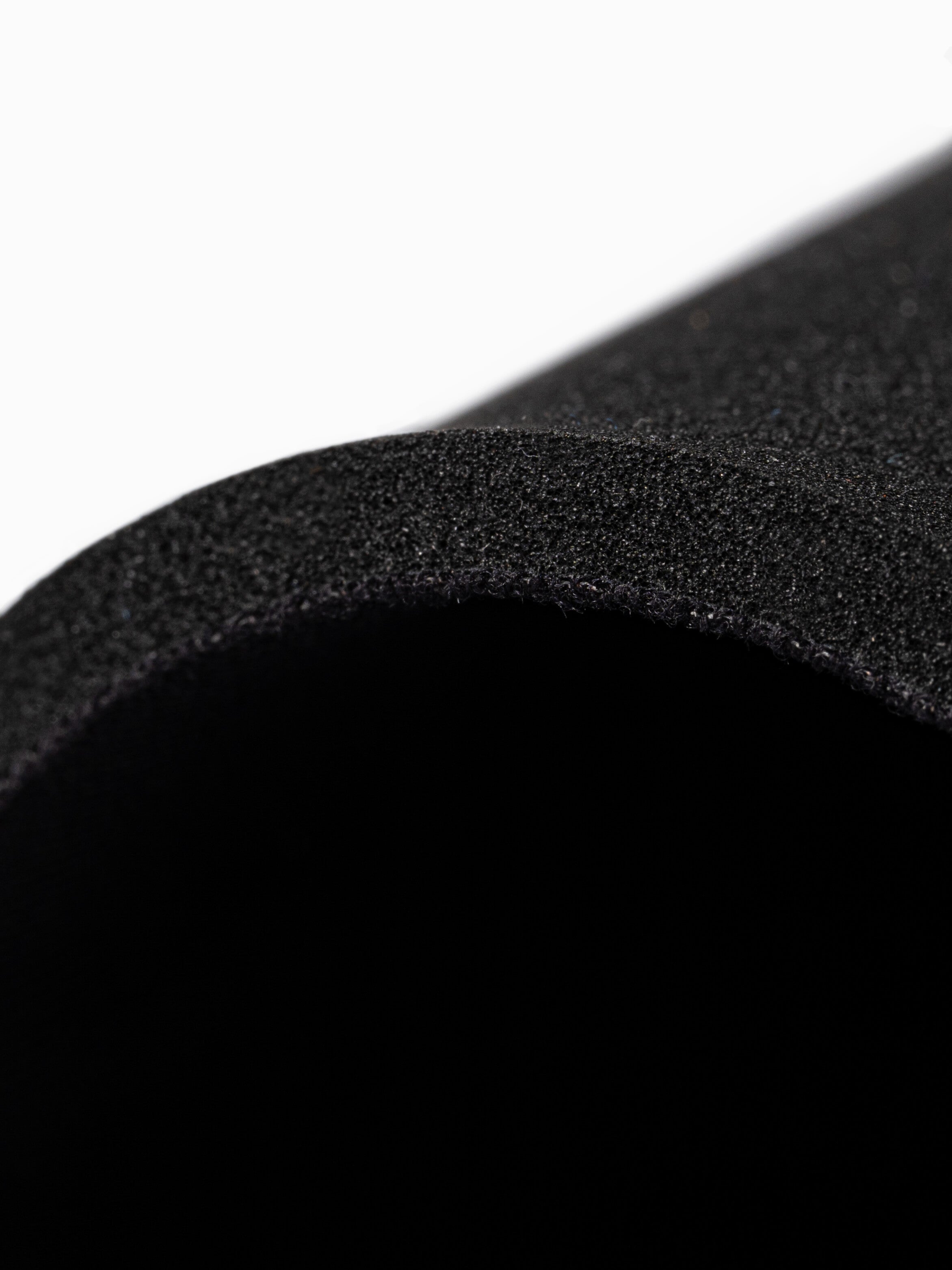 Close up showing the thickness of the 5mm neoprene used on open cell wetsuits
