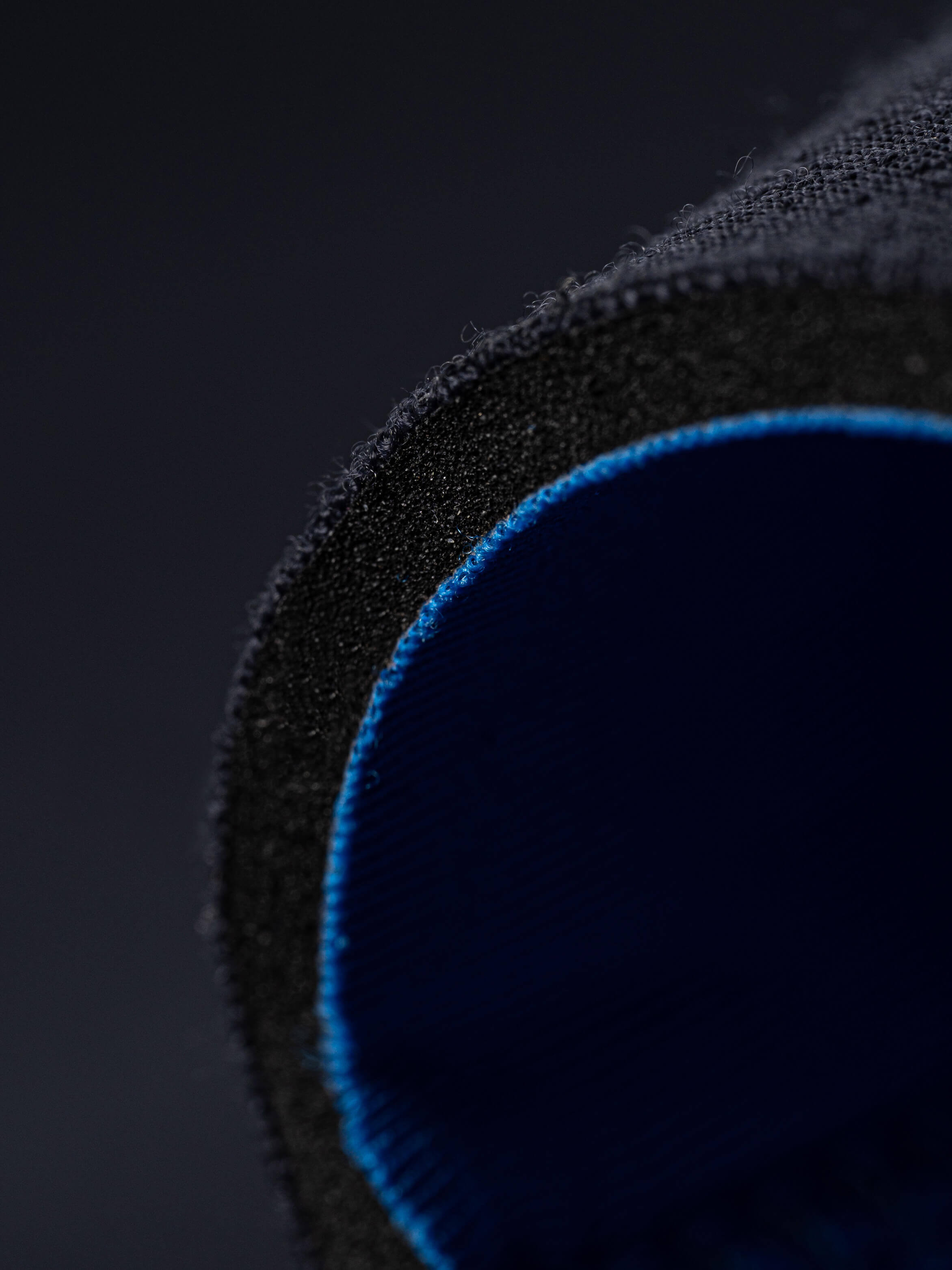 Close up of the thickness of the 2.5mm womens wetsuit by looking at the wrist seal cut. 